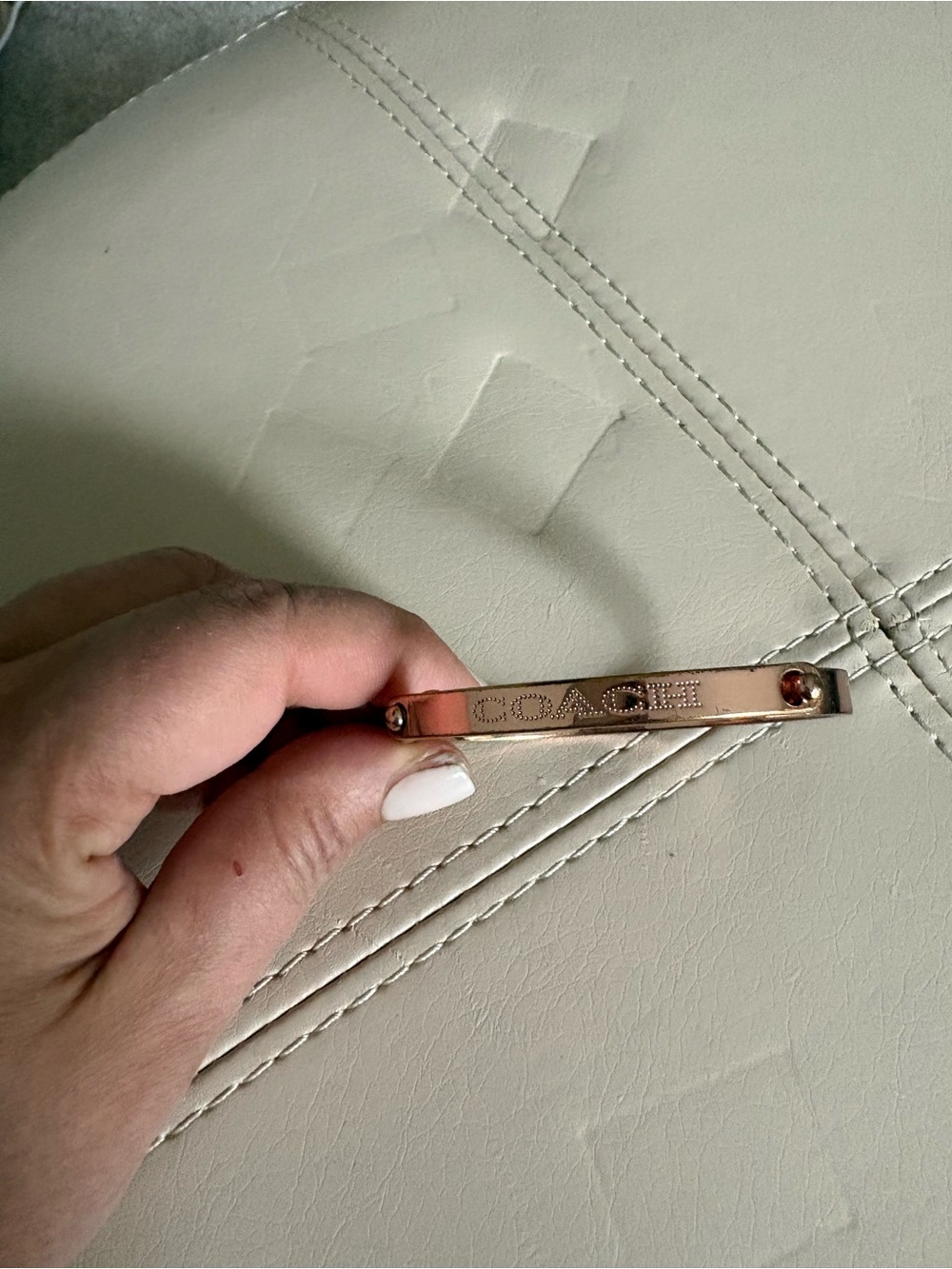 Coach Rose Gold Tone Logo Bar Bracelet.